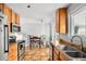 Kitchen with ample storage and views to the breakfast nook at 18130 E Asbury Dr, Aurora, CO 80013