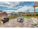 Scenic backyard with a patio area, dining set, and well-maintained lawn, perfect for gatherings at 965 Arapahoe Cir, Louisville, CO 80027