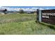 Davidson Mesa community sign with walking trails through open grassy area at 965 Arapahoe Cir, Louisville, CO 80027