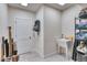 Functional mudroom with a utility sink, shelving, and storage options for organization at 965 Arapahoe Cir, Louisville, CO 80027