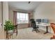 Bright office space featuring a large window, neutral walls, and carpet flooring, perfect for a productive work environment at 965 Arapahoe Cir, Louisville, CO 80027