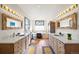 Bathroom featuring double sinks and a tub at 12291 S Critchell Ln, Littleton, CO 80127