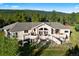 Gorgeous two-story home with a large deck and stunning mountain views, perfect for outdoor entertaining at 12291 S Critchell Ln, Littleton, CO 80127