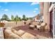 A beautiful patio featuring cushioned outdoor furniture with mountain views at 12291 S Critchell Ln, Littleton, CO 80127