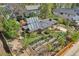 Aerial view of a charming home with solar panels, a lush yard, patio, and garden at 805 Union Ave, Boulder, CO 80304