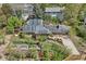 Bird's eye view of a brick home with solar panels, lush yard, and garden at 805 Union Ave, Boulder, CO 80304