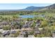 Scenic aerial view of the neighborhood, a lake, and the mountains in the background at 805 Union Ave, Boulder, CO 80304