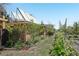 Beautiful backyard featuring lovely garden beds and healthy, green landscaping at 805 Union Ave, Boulder, CO 80304