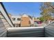 Balcony view capturing the neighborhood's architecture and serene surroundings for a sense of community and place at 2491 S Xanadu Way # A, Aurora, CO 80014