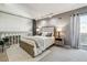 Cozy bedroom featuring soft carpet, gray walls, a loft, and modern decor for a comfortable living space at 2491 S Xanadu Way # A, Aurora, CO 80014