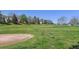 Scenic view of a lush golf course with geese, offering a glimpse of the serene and recreational amenities nearby at 2491 S Xanadu Way # A, Aurora, CO 80014