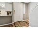 Entryway boasts wood-look flooring, a decorative rug, and a conveniently placed coat closet at 2491 S Xanadu Way # A, Aurora, CO 80014
