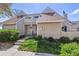 Charming home featuring well-maintained landscaping and a welcoming front porch at 2491 S Xanadu Way # A, Aurora, CO 80014