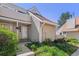 Inviting home exterior featuring tidy landscaping and a covered porch area at 2491 S Xanadu Way # A, Aurora, CO 80014