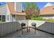 Inviting outdoor patio with a seating area, designed for relaxation and entertainment, showcasing the home's outdoor living space at 2491 S Xanadu Way # A, Aurora, CO 80014