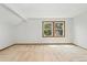 Large, carpeted bedroom with two large windows providing natural light at 6414 S Hudson St, Centennial, CO 80121
