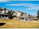 Well-maintained townhome community featuring grassy common areas and a charming gazebo at 14700 E 104Th Ave # 2605, Commerce City, CO 80022