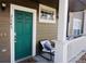 Charming front door with a welcoming exterior and seating area at 14700 E 104Th Ave # 2605, Commerce City, CO 80022
