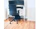 Functional office space with a desk, chair, and modern computer setup at 14700 E 104Th Ave # 2605, Commerce City, CO 80022