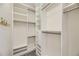 Spacious walk-in closet with custom shelving and ample storage space at 9481 E Mansfield Ave # 301, Aurora, CO 80014