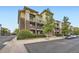 Exterior view of a well-maintained building with multiple balconies at 9481 E Mansfield Ave # 301, Aurora, CO 80014