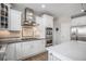 Beautiful kitchen featuring stainless steel appliances, double ovens, and a gas cooktop at 26989 E Friend Pl, Aurora, CO 80016