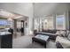Stylish living room flows into the dining area, boasting an open floor plan and comfortable seating at 26989 E Friend Pl, Aurora, CO 80016