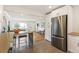 Modern kitchen with stainless steel appliances and an eat-in island at 1180 E Girard Ave, Englewood, CO 80113