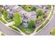 An aerial view of a charming neighborhood and a home with lush landscaping at 23870 E Dorado Pl, Aurora, CO 80016