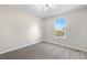 Bright bedroom with carpet and a window offering a view of the outdoors at 23870 E Dorado Pl, Aurora, CO 80016