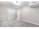 Neutral bedroom with carpeted floor, closet with sliding doors, and baseboard trim at 23870 E Dorado Pl, Aurora, CO 80016