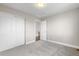 Comfortable bedroom with carpet floors and a large closet with sliding doors at 23870 E Dorado Pl, Aurora, CO 80016