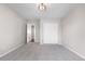 Bedroom features carpet, neutral walls, a closet, and a door leading to a hallway at 23870 E Dorado Pl, Aurora, CO 80016