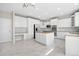 Well-equipped kitchen with granite countertops, stainless steel appliances, and white cabinetry at 23870 E Dorado Pl, Aurora, CO 80016