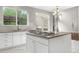 Bright, updated kitchen with granite countertops, a gas cooktop, and modern fixtures at 23870 E Dorado Pl, Aurora, CO 80016