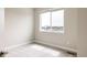 Bright bedroom with a large window overlooking the neighborhood at 6307 Dayton Ct, Denver, CO 80238