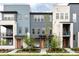 Charming townhomes with modern exteriors, bright doors, and well-maintained landscaping create curb appeal at 6307 Dayton Ct, Denver, CO 80238