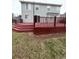 A large multi-tiered deck is attached to a home with light blue siding at 19193 E Amherst Dr, Aurora, CO 80013