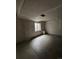 Unfinished basement, offering lots of natural light through a single window at 19193 E Amherst Dr, Aurora, CO 80013