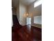 The front entryway is spacious and features hardwood floors and a staircase at 19193 E Amherst Dr, Aurora, CO 80013