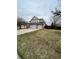 Spacious front yard leads to a home with a three car garage and stone accents at 19193 E Amherst Dr, Aurora, CO 80013