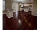 The spacious kitchen has hardwood floors and a breakfast bar at 19193 E Amherst Dr, Aurora, CO 80013
