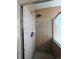 This bathroom has a shower with glass doors and tile surround at 19193 E Amherst Dr, Aurora, CO 80013
