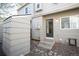 Backyard area features a walk-out door to back at 7978 Chase Cir # G, Arvada, CO 80003