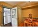 Cozy dining area with table set for a meal and walk-out to back at 7978 Chase Cir # G, Arvada, CO 80003