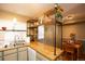 Bright kitchen featuring butcher block counters, stainless steel sink, and decor at 7978 Chase Cir # G, Arvada, CO 80003