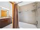 Bathroom featuring a shower with a stylish shower head, tiled walls, and modern finishes at 7350 Timber Trail Rd, Evergreen, CO 80439