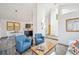 Spacious living area featuring vaulted ceilings and views of the kitchen and dining room at 7350 Timber Trail Rd, Evergreen, CO 80439