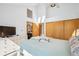 Bright main bedroom features a walk-in closet and ensuite bathroom at 7350 Timber Trail Rd, Evergreen, CO 80439