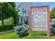 Charming community sign for Dutch Ridge located in a covenant-controlled community with beautiful landscaping at 9278 W Ontario Dr, Littleton, CO 80128